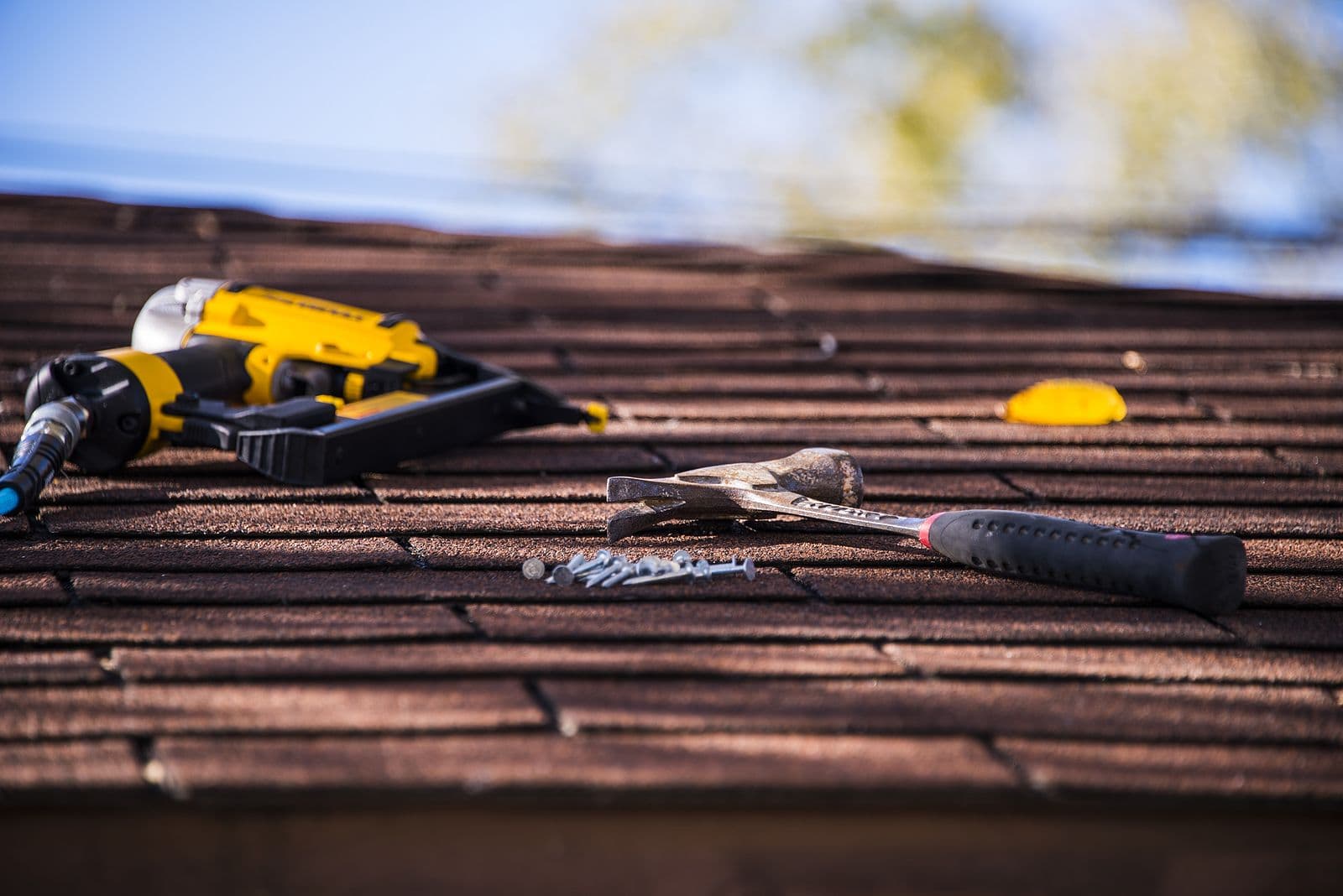 Tools sit on a roof.