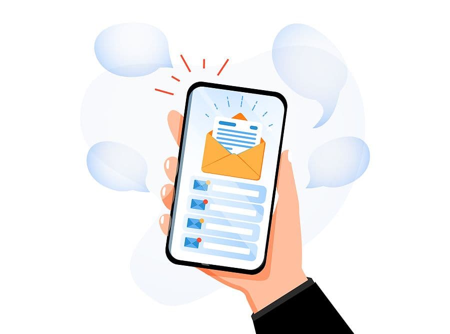 Hand holding mobile smart phone with mail app.