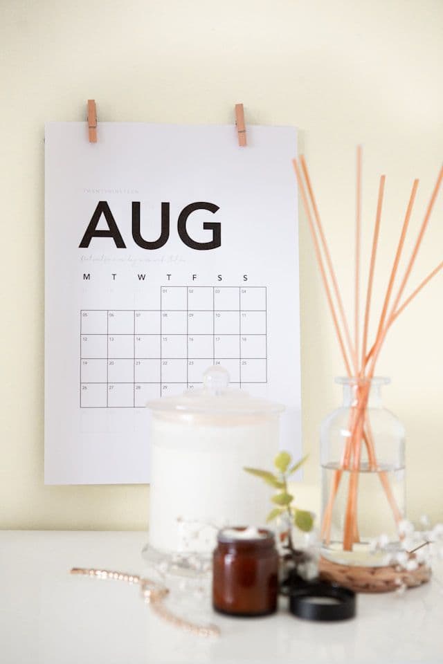 A wall calendar showing the month of August.