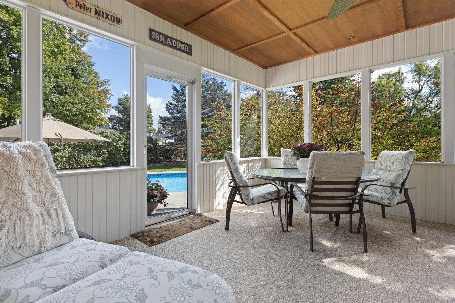 A three-season screened porch sunroom.